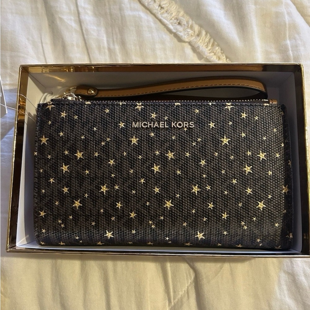 Michael Kors Black and Gold Star Wristlet